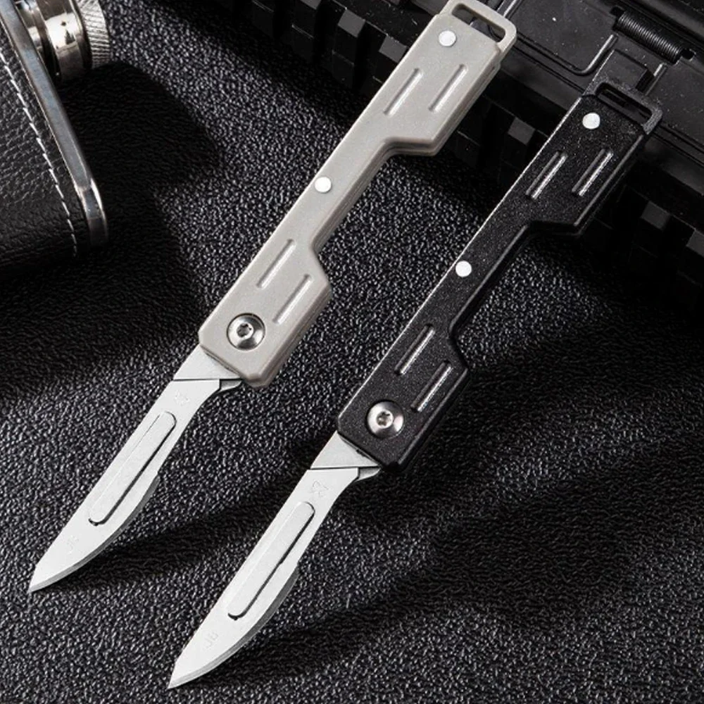 Cuchillo plegable compacto para uso EDC
