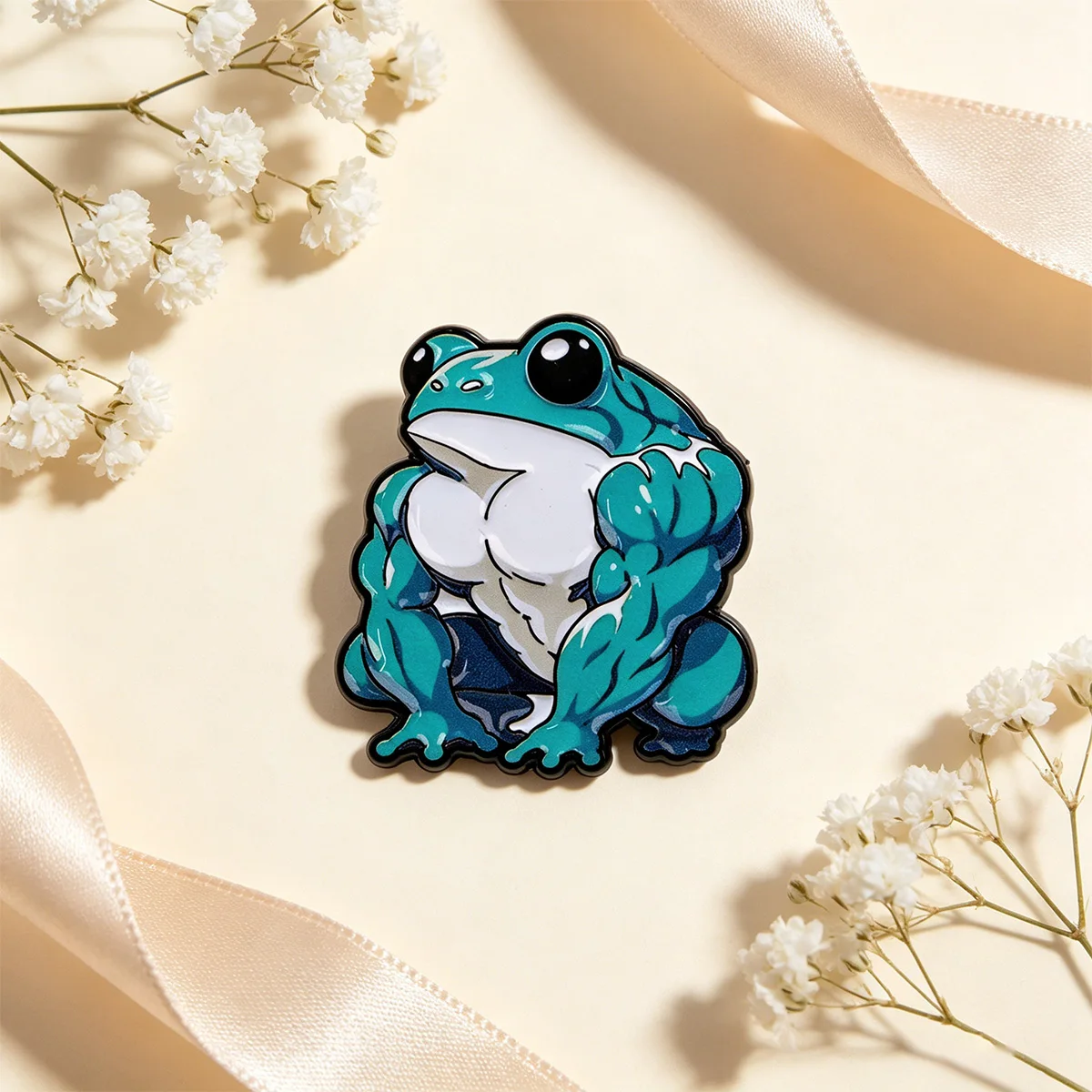 Rana musculosa esmaltada como broche