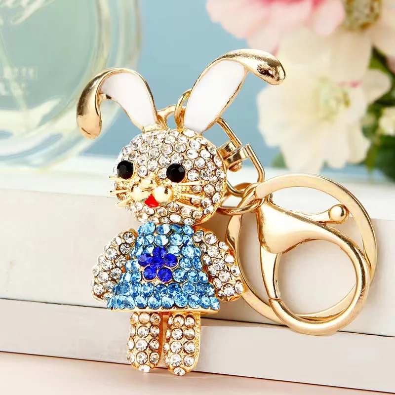Llavero metálico ligero con diamantes de imitación conejo blanco - imagen 2