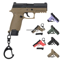 Llavero pistola miniatura realista de plástico con cargador extraíble