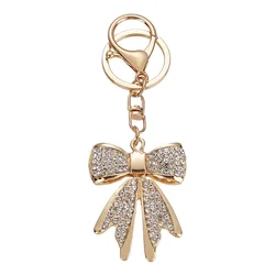 Llavero de cristal dorado con lazo brillante para bolso femenino