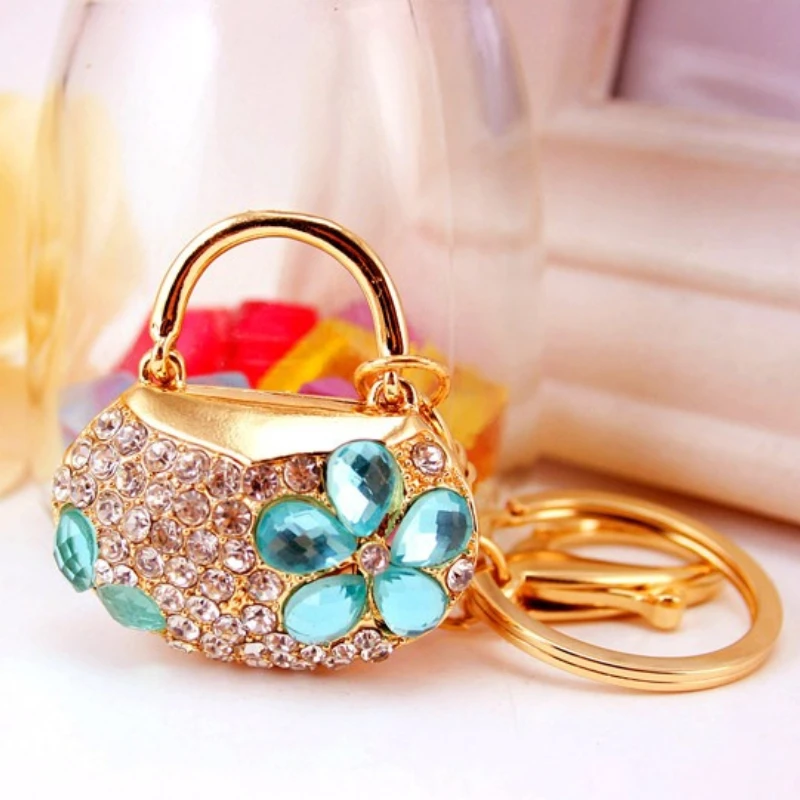 Llavero bolso flor cristal azul metal dorado strass - imagen 2