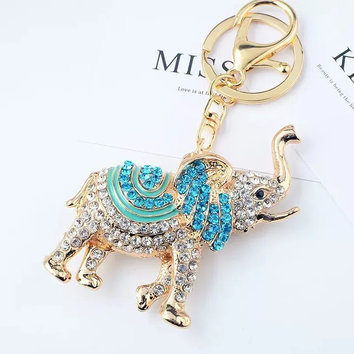 Llavero elefante con diamantes de imitación y colgante dorado - imagen 5