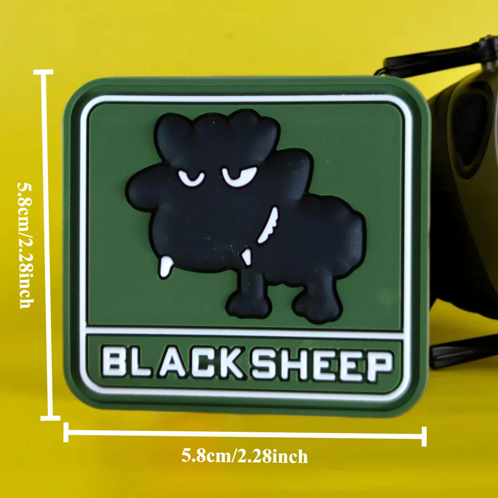 Parche BLACK SHEEP colocado sobre superficie de bucle