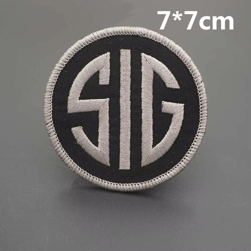 Parche SIG SAUER en chaqueta y gorro