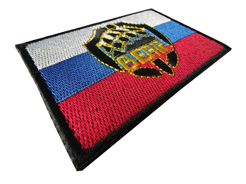 Insignia triangular bordada para fijar en accesorios tácticos