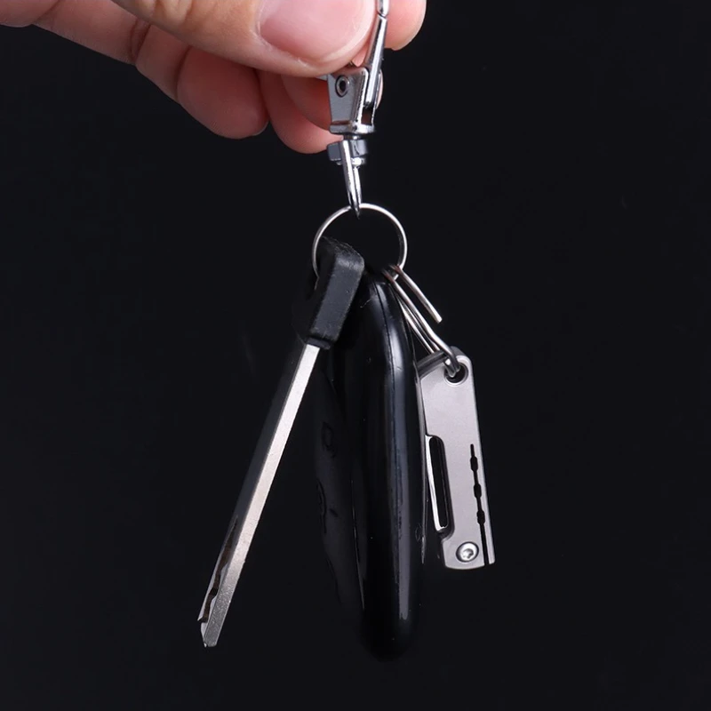 Navaja táctica plegable de aleación de titanio mini compacta en monte