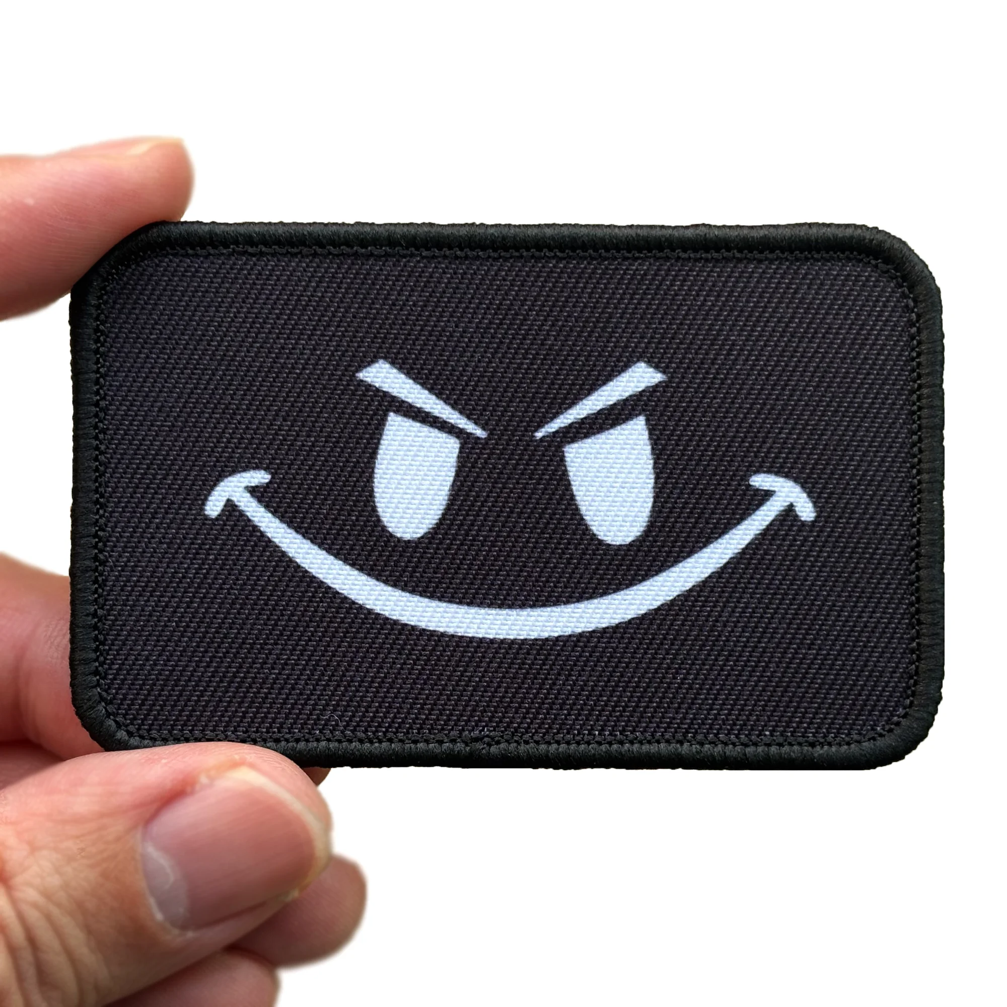 Parche táctico bordado cara sonriente malvada meme con velcro - imagen 2