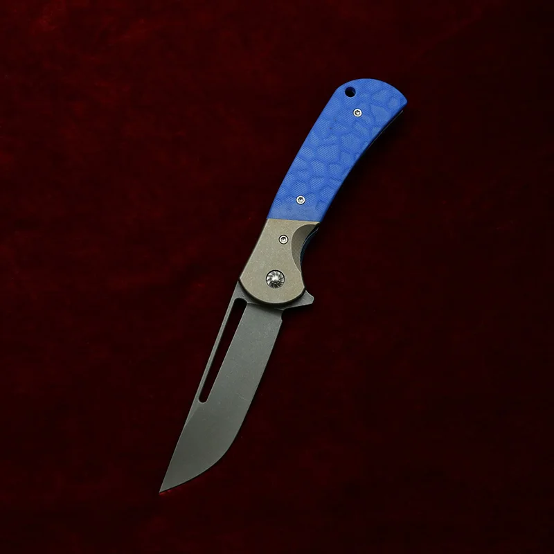 Mango G10 y clip metálico para el transporte