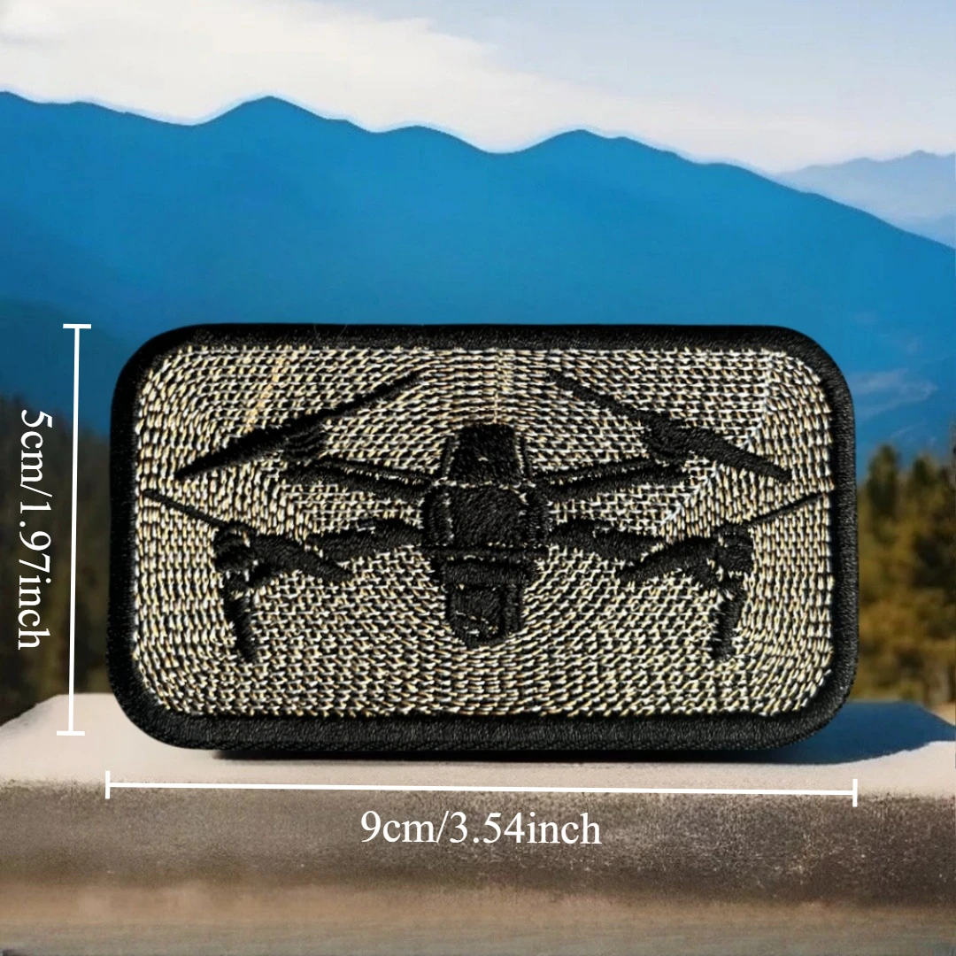 Parche táctico bordado con diseño UAV en fondo oscuro
