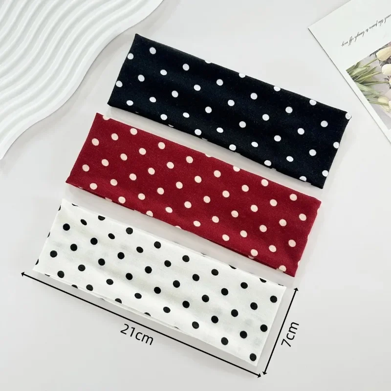 Diadema deportiva elástica absorbente de sudor con diseño en puntos