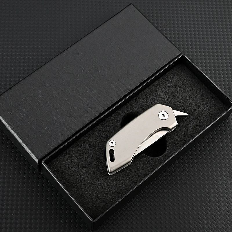 Cuchillo plegable táctico Titanio D2 de alta dureza con llavero - imagen 4