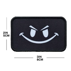 Parche táctico bordado cara sonriente malvada meme con velcro