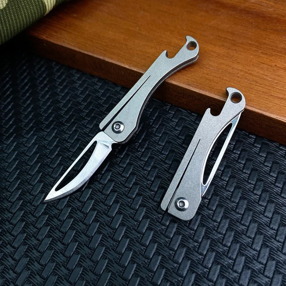 TC4 mini cuchillo plegable EDC en aleación de titanio – llavero