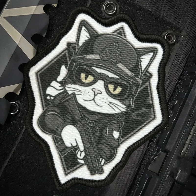 Varios diseños de parches tácticos gato