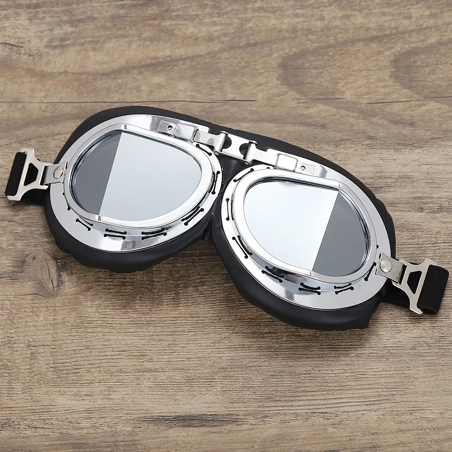 Detalle de gafas con lente oscura y montura cobre