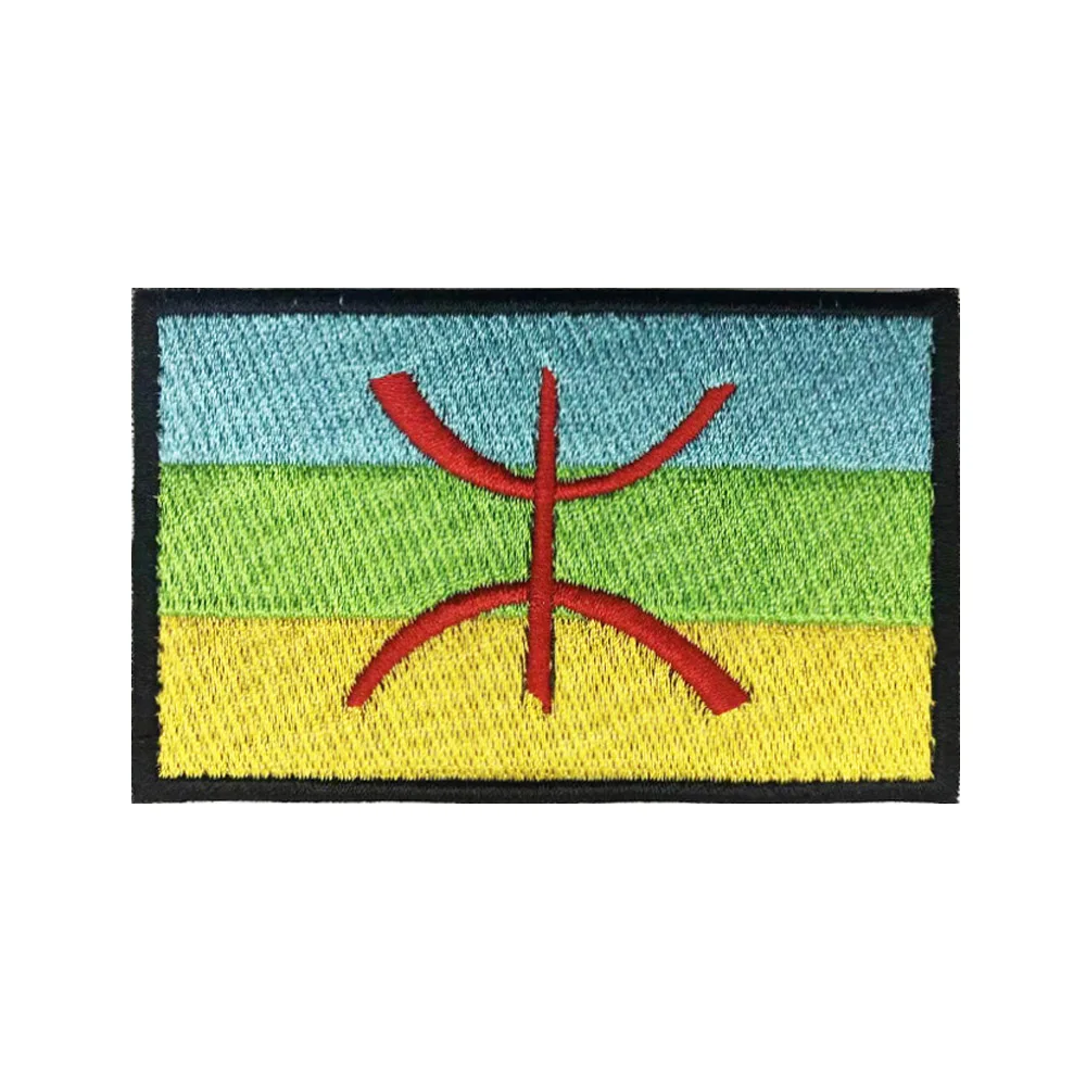 Insignia berber con detalle de bordado y base de velcro