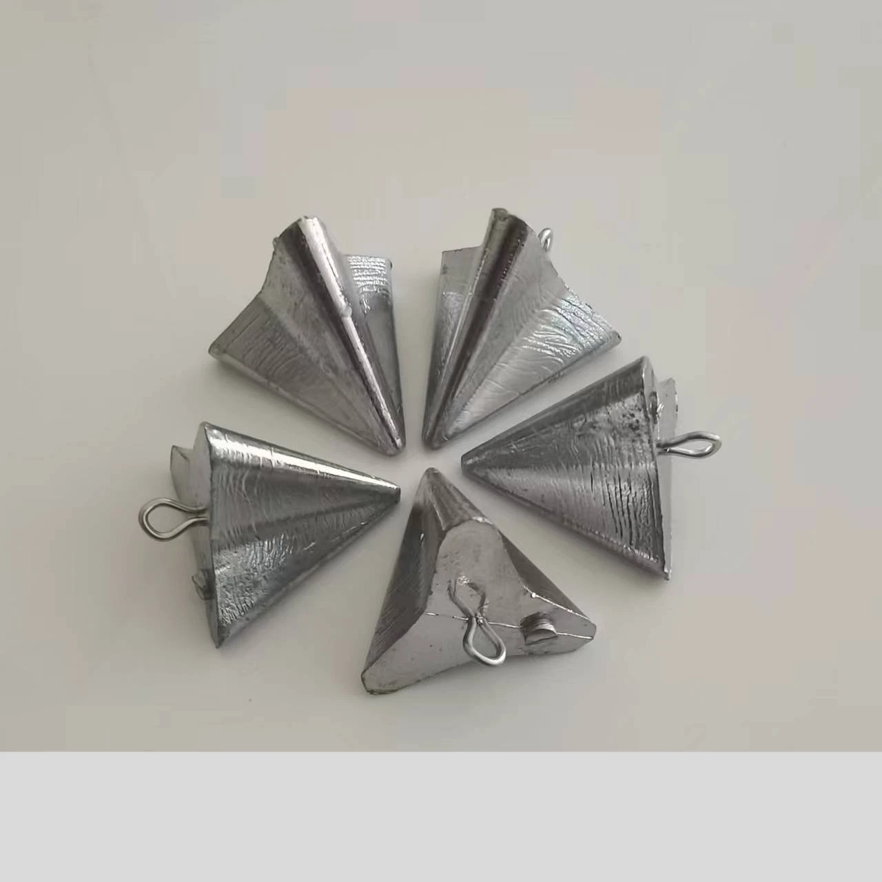 Colgante de plomo triangular gota agua para pesca mar posicionamiento