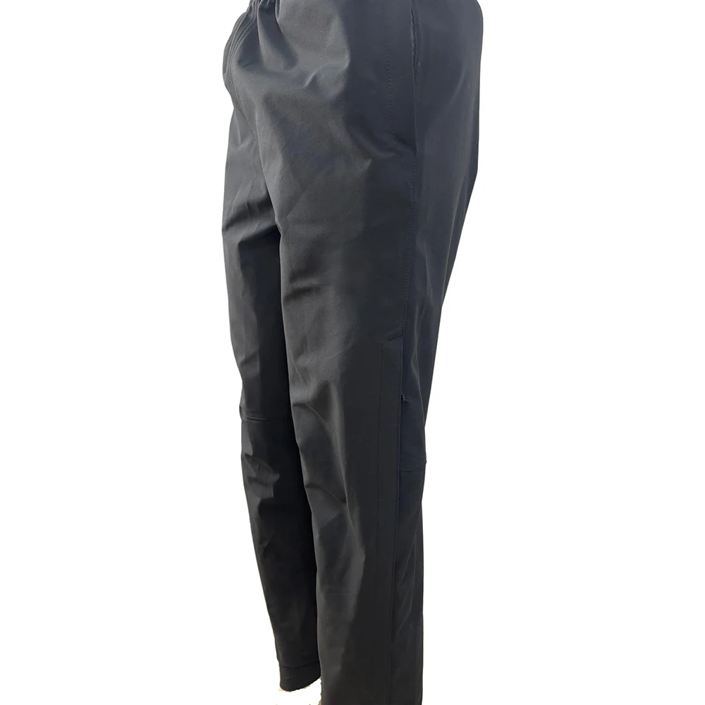 Pantalones impermeables sellado a presión con cremallera lateral