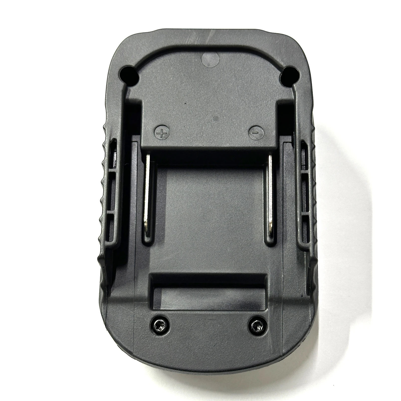Vista lateral del adaptador donde se aprecia el conector y la construcción robusta