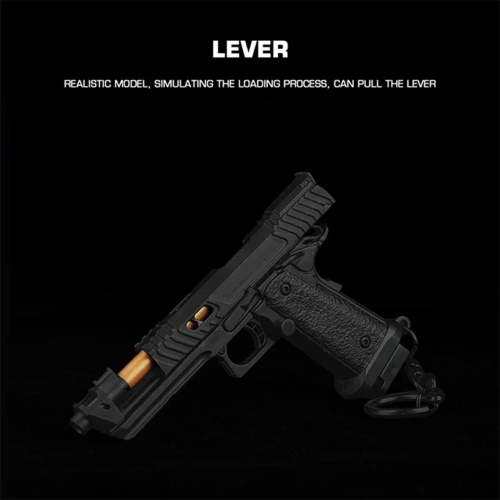Mini pistola de plástico para llavero