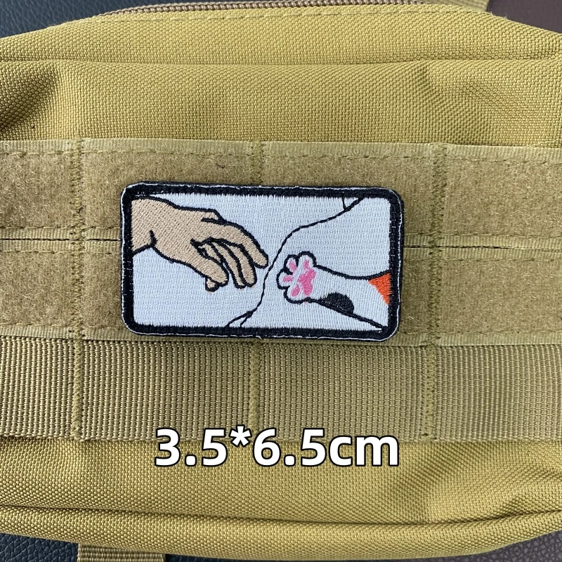 Detalle del bordado del gato