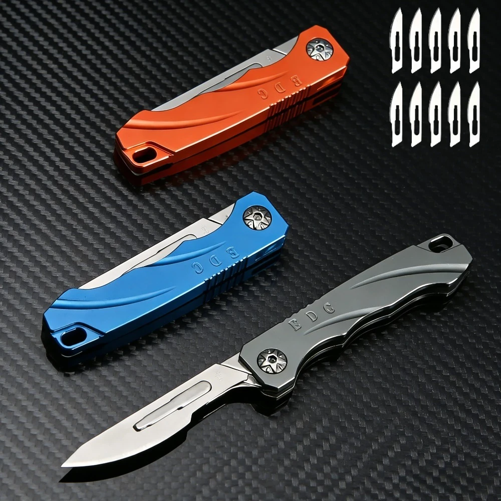 Navaja plegable mini con cuchilla pequeña y llavero para paquetes - imagen 5