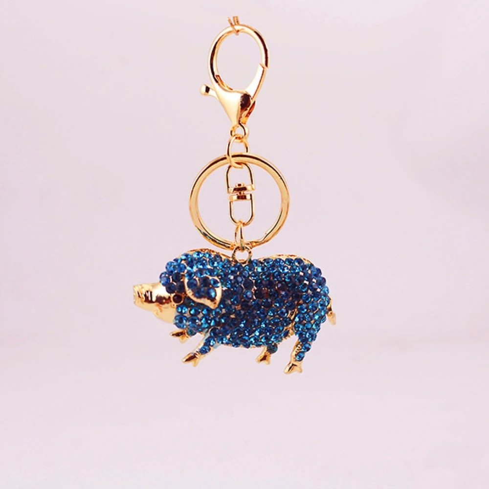 Llavero cerdo con cristales azules – Colgante metal dorado para bolso - imagen 4