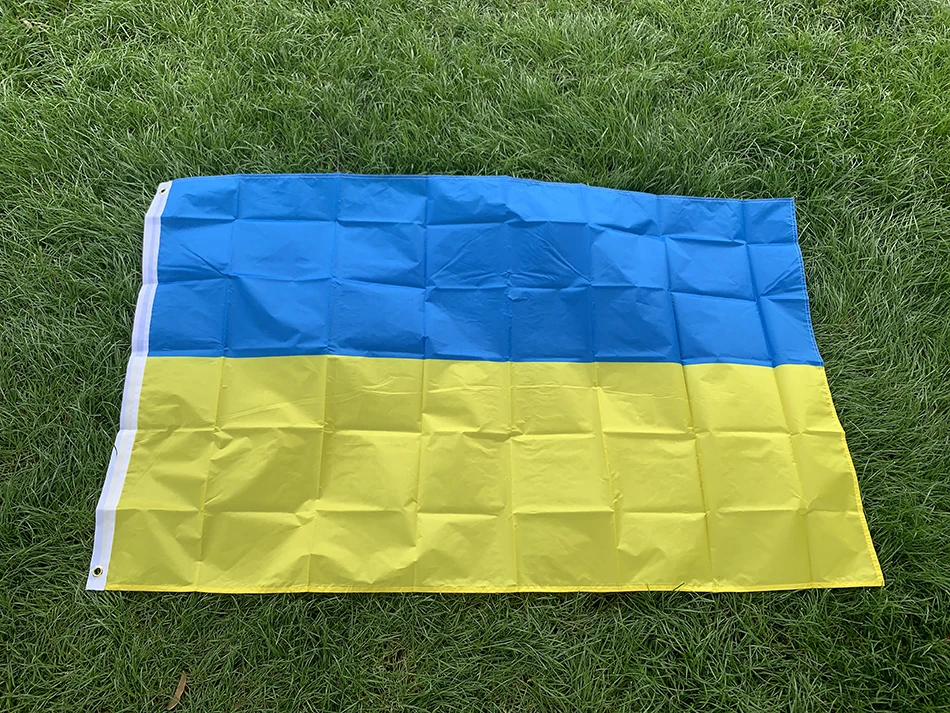 Detalle de la costura y el poliéster de la bandera