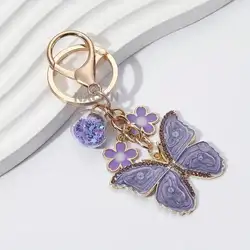Llavero acrílico mariposa y flor, accesorio decorativo para bolso