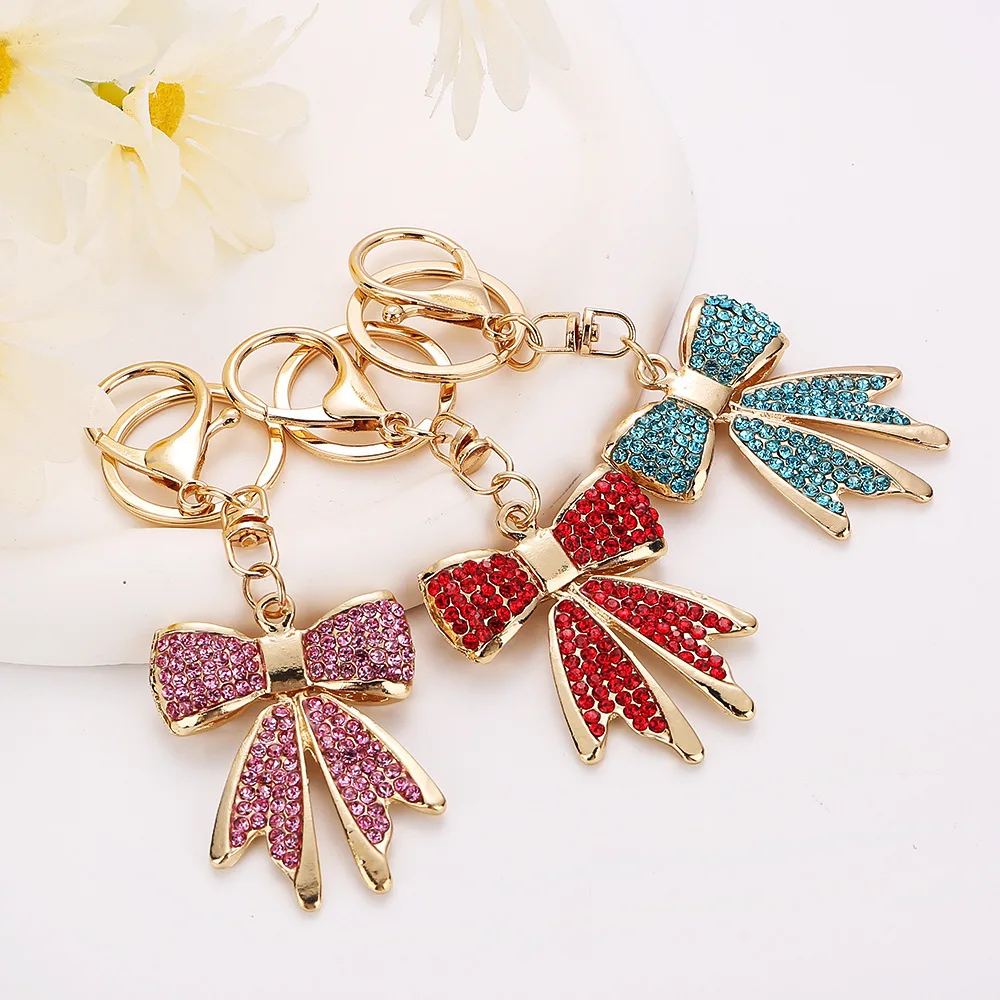 Llavero de cristal dorado con lazo brillante para bolso femenino - imagen 4