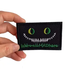 Parche reflectante emblema bordado táctico ojo de gato Cheshire