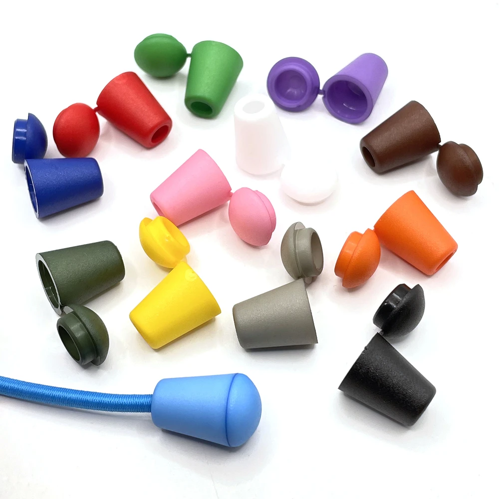 Pack de 20 extremos de cordón de plástico colorido con tapón de campana