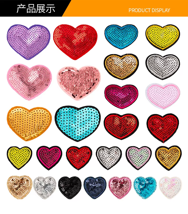 Detalle de corazón con lentejuelas y letrero de amor