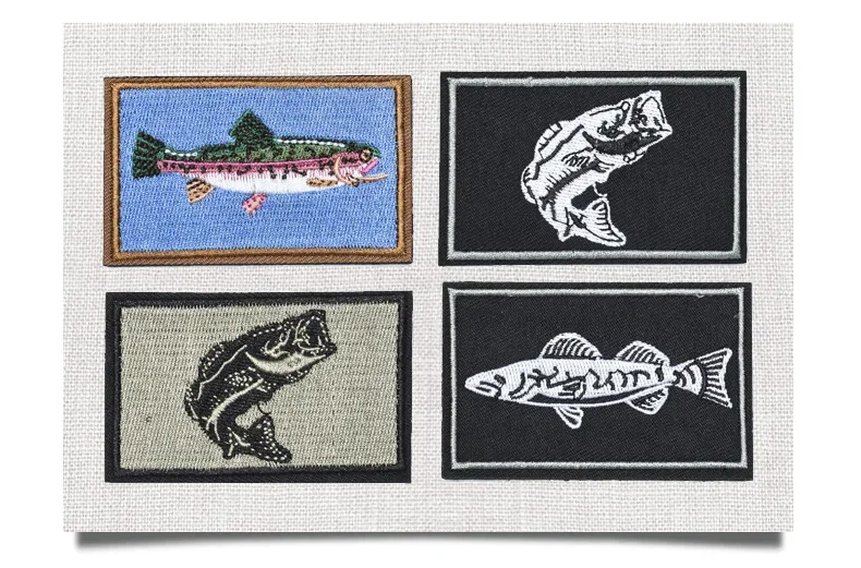 Apliques bordados con motivos de pesca y cierre