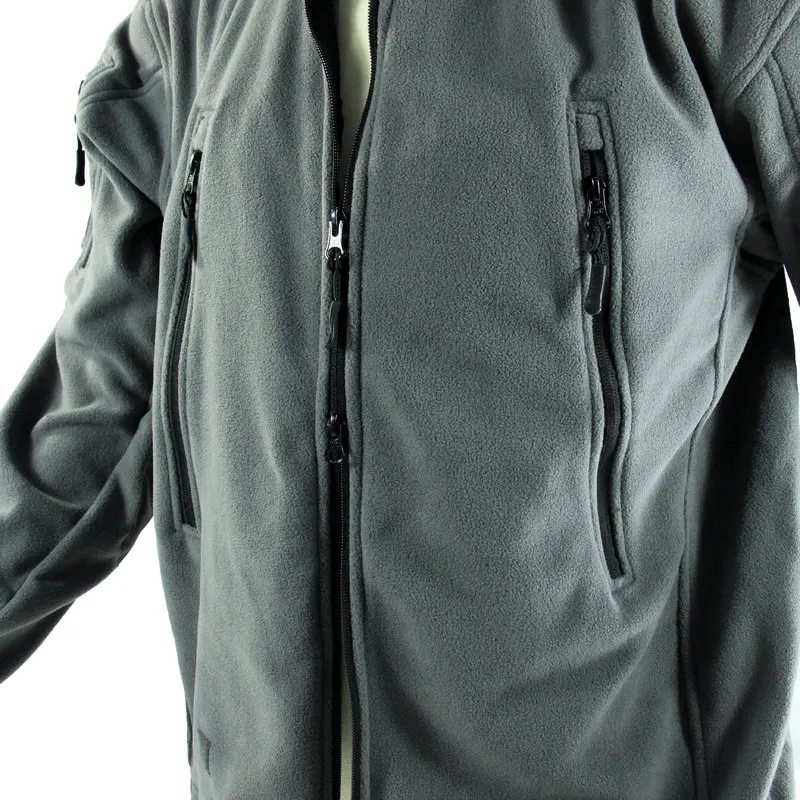 Chaqueta forro polar táctico nylon reforzado gris resistente al viento