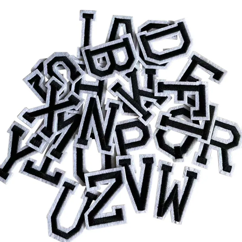 Parches de letras en color negro para transferir y planchar