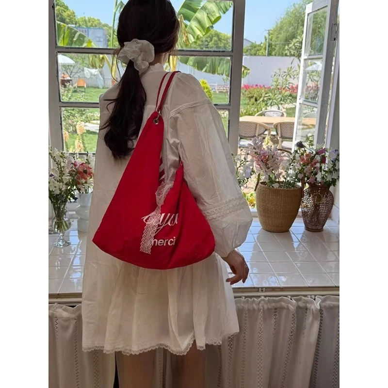 Bolso a rayas de gran capacidad en lona