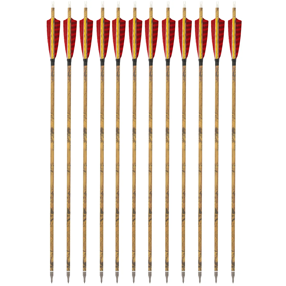 Flechas de carbono con plumas naturales y puntas removibles