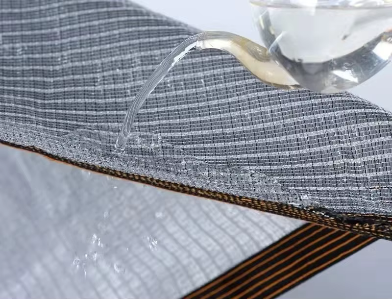 Toldo de doble cara con ribetes y argollas