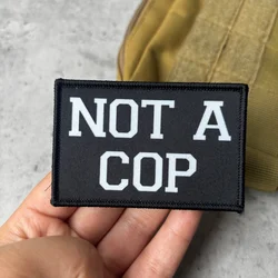 Parche táctico moral No Soy Policía con gancho y bucle