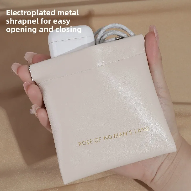 Bolsa organizadora elástica para cables con cierre automático