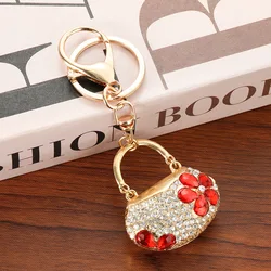 Llavero de bolso tipo mini bolso con cristales brillantes para mujer
