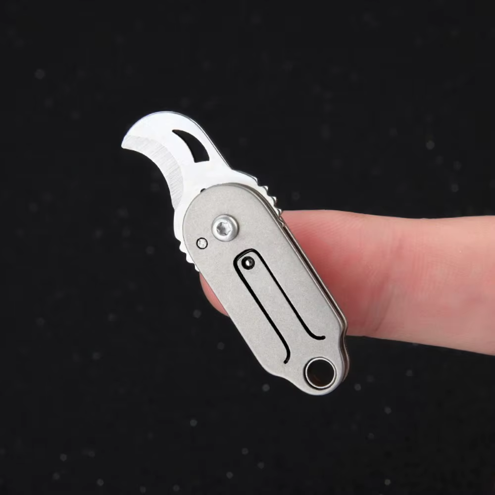 Navaja plegable táctica multiusos de titanio compacta para exteriores - imagen 4