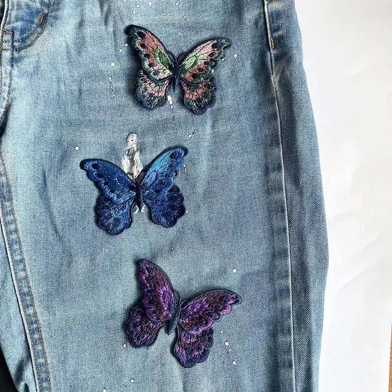 Mariposa colorida retro para vestidos y prendas