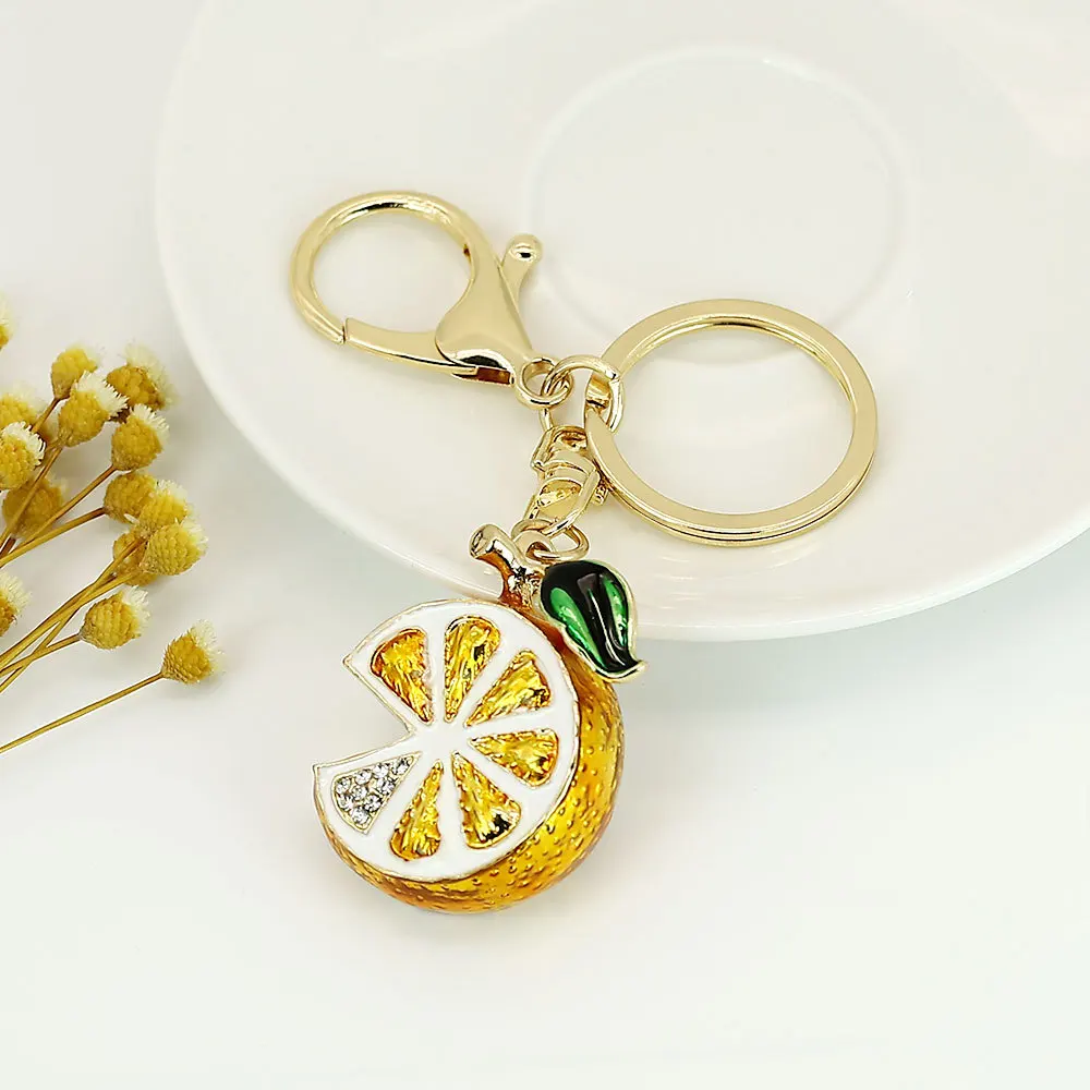 Llavero limón con diamantes de imitación para coche y bolso