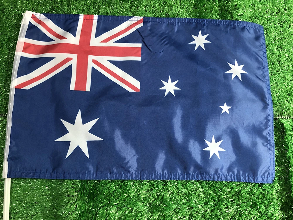 Bandera ondeante con portador en uso