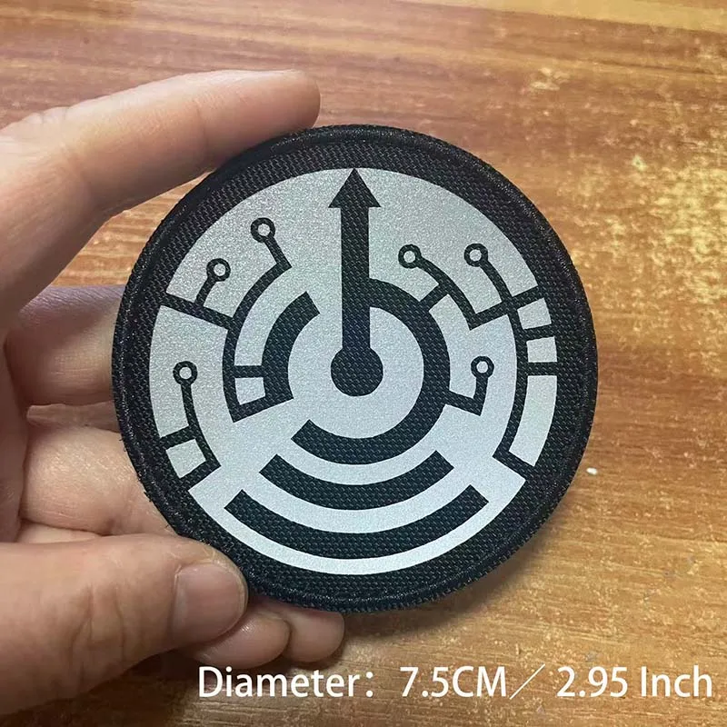 Emblema reflectante para sombrero