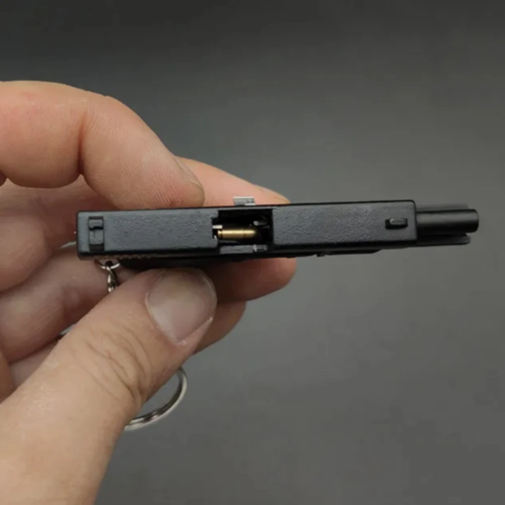 Llavero Glock 17 táctico con piezas móviles y forma de pistola - imagen 4