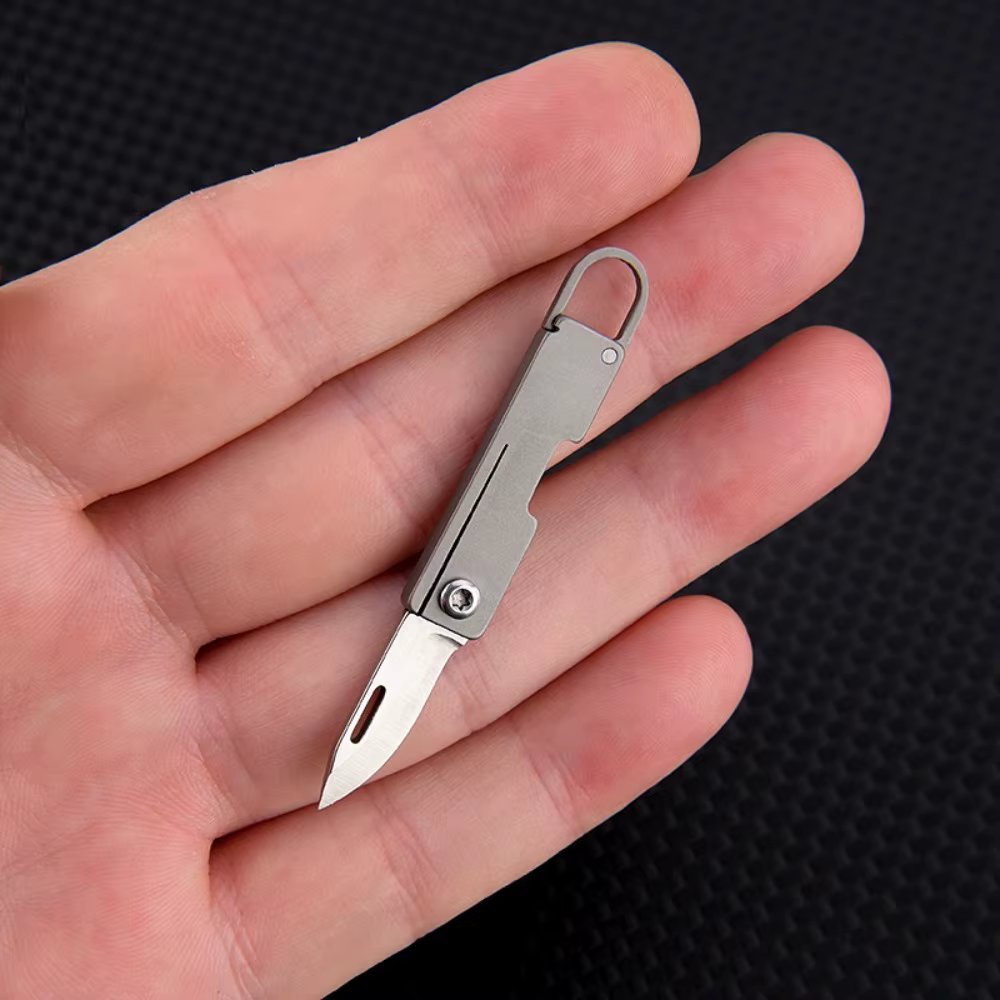 Navaja plegable táctica multiusos de titanio compacta para exteriores - imagen 3